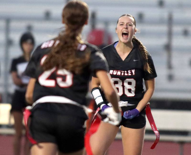 Huntley’s Elena Fetzer howls with delight after making a defensive stop to end McHenry’s final offensive series of the fourth quarter in varsity flag football at Huntley High School in Huntley on Tuesday, Sept. 9, 2025.