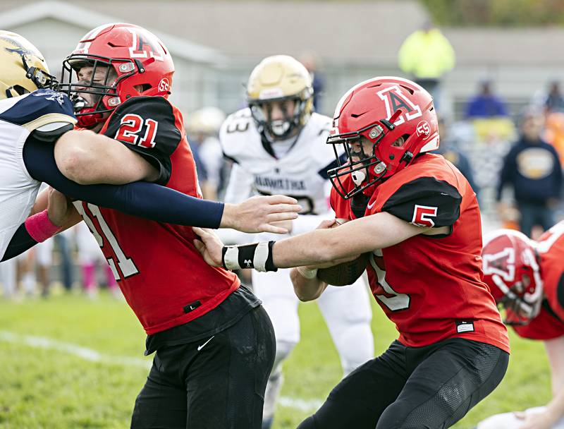 Amboy’s Landon Whelchel follows his blockers Saturday, Oct. 28, 2023 against Hiawatha in the I8FA playoffs in Amboy.