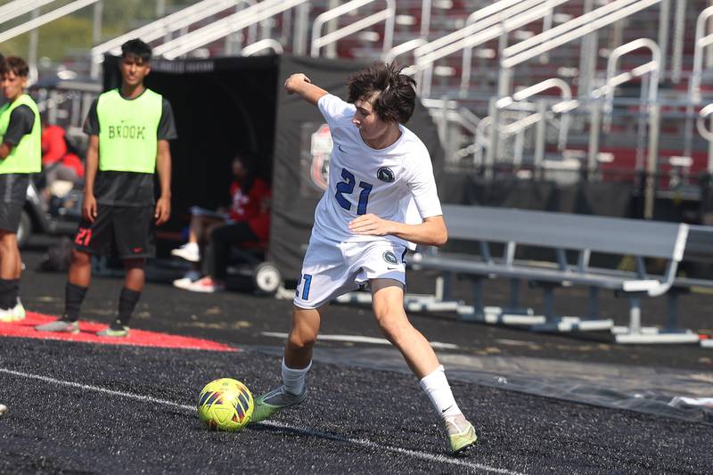 Lincoln-Way East’s Ronan Treacy works the ball along the sidelines against Bolingbrook on Saturday, Sept. 30, 2023 in Bolingbrook.
