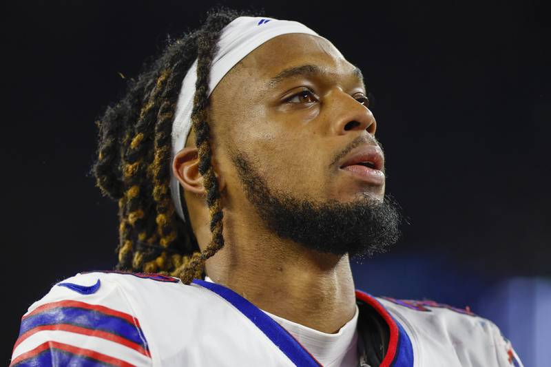 Buffalo Bills defensive back Damar Hamlin leaves the field after an NFL game against the New England Patriots, Thursday, Dec. 1, 2022, in Foxborough, Mass.