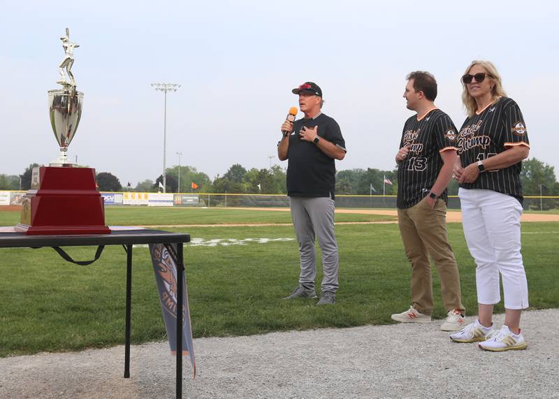 Illinois Valley Pistol Shrimp team owner and field manager John Jakiemiec, speaks as Lucas Burris Voice of Pistol Shrimp Baseball, and June Keeley General Manager of the Pistol Shrimp, listen during the 2024 Championship Celebration on Thursday, June 5, 2025 at Schweickert Stadium in Peru.