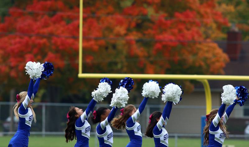 Woodstock girls entertain during halftime against Ottawa in varsity football at Larry Dale Field on the campus of Woodstock High School Saturday.