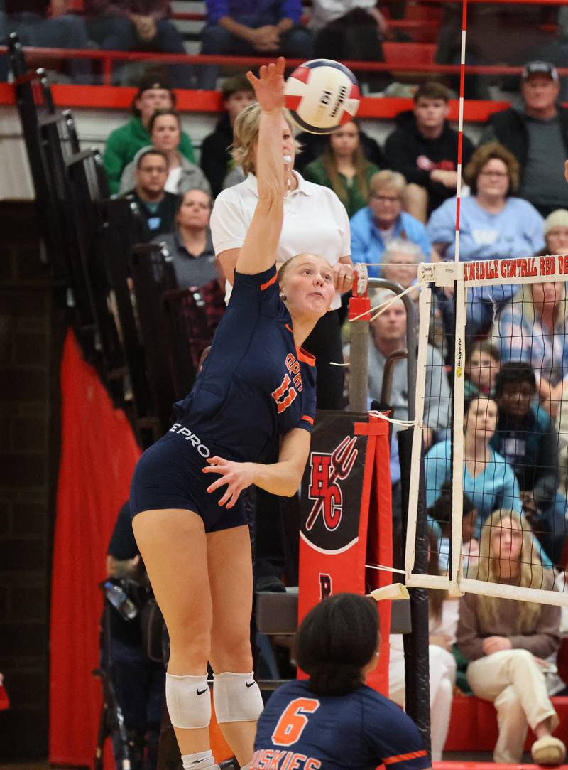 Oak Park-River Forest’s Grace Nelson (11) goes for a kill against Willowbrook during the 4A girls varsity volleyball sectional final match at Hinsdale Central high school on Wednesday, Nov. 1, 2023 in Hinsdale, IL.
