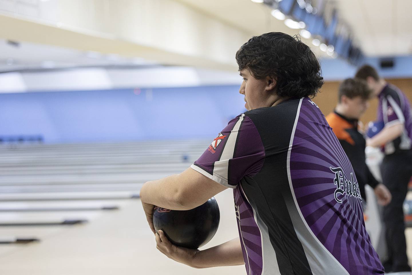Dixon’s Wyatt Miller eyes the pins during Dixon’s Toughman Tournament at Plum Hollow Thursday, Jan. 2, 2025.