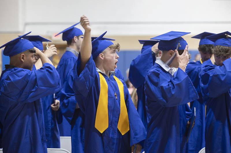 Graduates celebrate after receiving their diplomas Wednesday, May 17, 2023 at Newman High School.