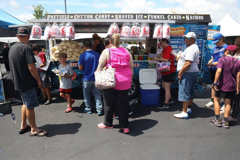 Customers line up at one of the food trucks at Comicolopis, Lockport’s 7th annual Comic and Fandom Con on Saturday, July 29.