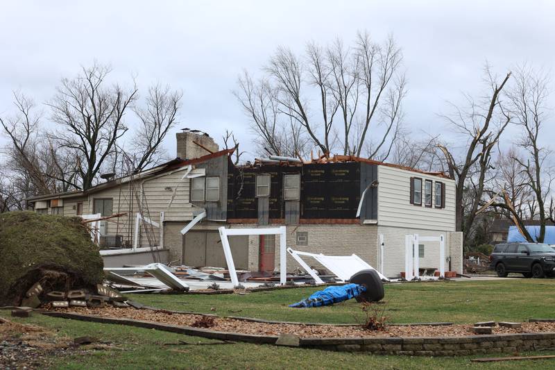 Damage to homes is seen near Julie Drive in Aroma Park on March 11, 2026 following a March 10 tornado that passed through Kankakee County.