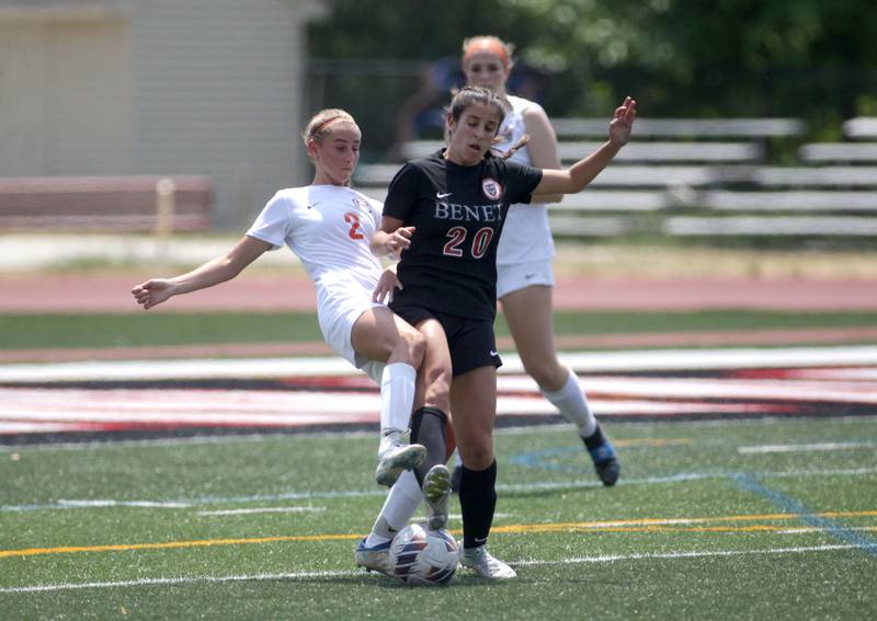 Crystal Lake Central’s Kalissa Kaiser (left) and Benet’s Ivana Vukas go after the ball during a Class 2A girls state soccer semifinal at North Central College in Naperville on Friday, June 2, 2023.