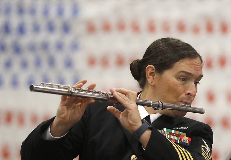 U.S. Navy Chief Musician Cassy Hamilton plays “Anchors Aweigh” with the rest of the Navy Band Great Lakes during the Veterans Day ceremony Wednesday, Nov.8, 2023, at Alden-Hebron High School in Hebron.