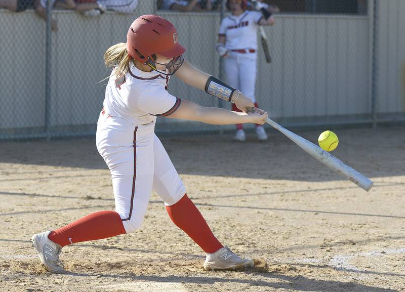 Ottawa’s Bobbi Snook connects to hit a double in the third inning Wednesday against Sycamore at Ottawa.