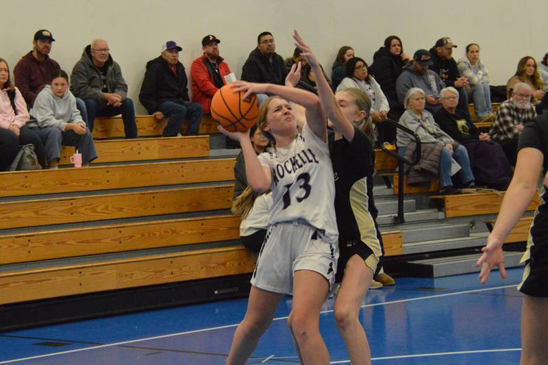 Rochelle's Tess Kissack is fouled as she attempts a shot during a JV basketball game with Sycamore