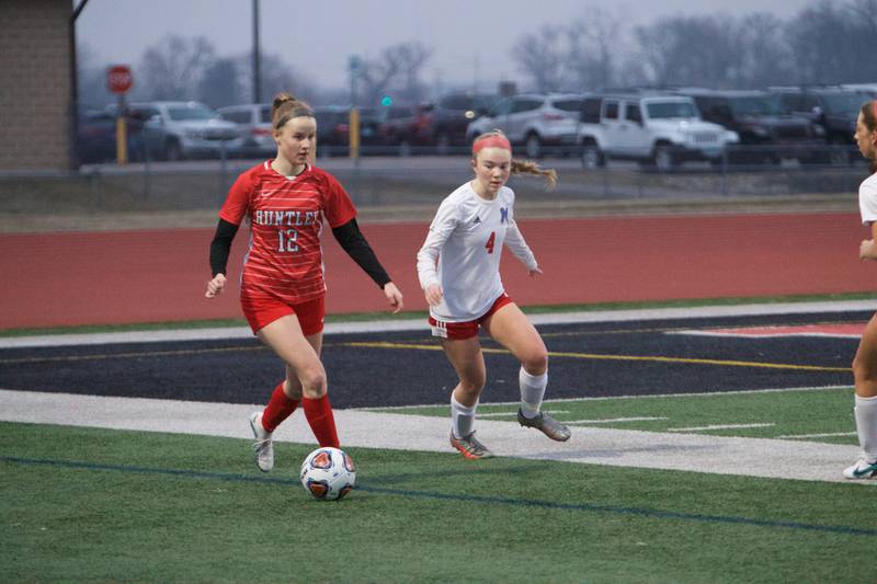 Huntley's Alex Szydlowski looks to advance the ball against   Marian Central's Greta Fortin on Wednesday March 22, 2023 in Huntley.