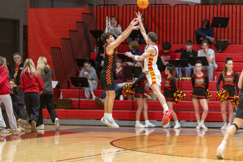 St. Charles East's Michael Hill shoots a three pointer against Batavia on Friday, Jan.9,2026 in Batavia.