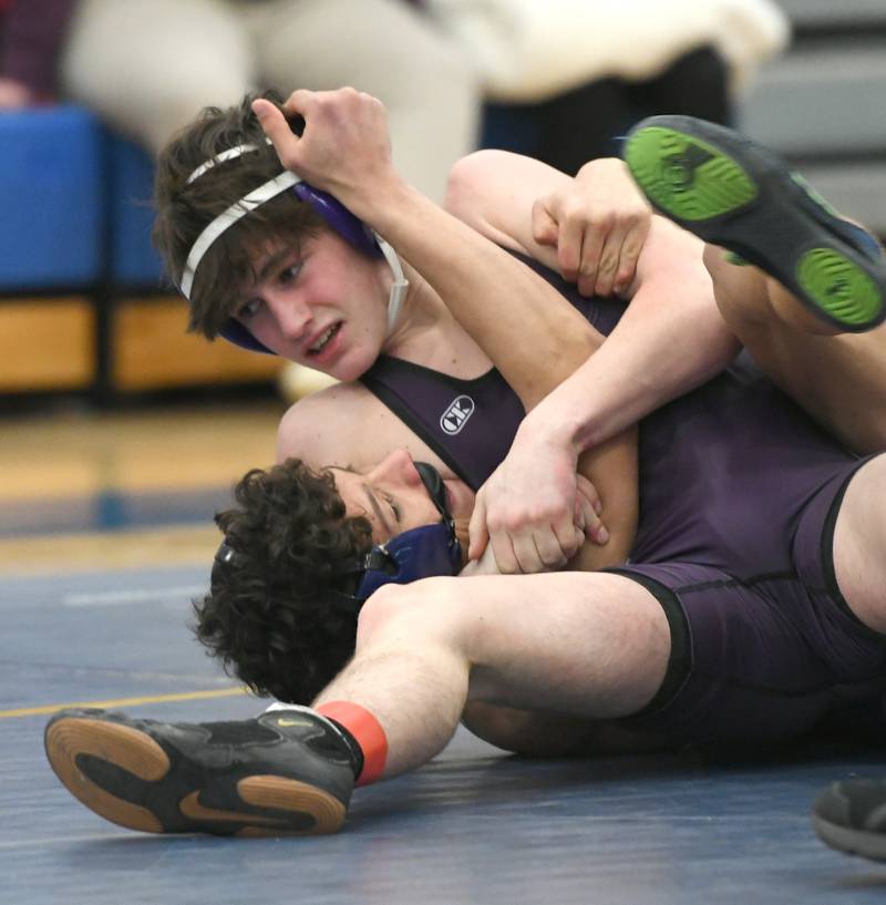 Dixon's Gavin Kramer (top) wrestles Princeton's Kadin Gibson for third place at 120 pounds at the 1A Polo Wrestling Regional held at Eastland High School in Lanark on Saturday, Feb. 4.