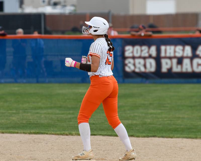 Oswego's Sabrina Zamora (15) is all smiles after hitting a double and allowing a run to score on Tuesday June 3, 2025, while taking on Yorkville in the sectional semifinal game held at .
