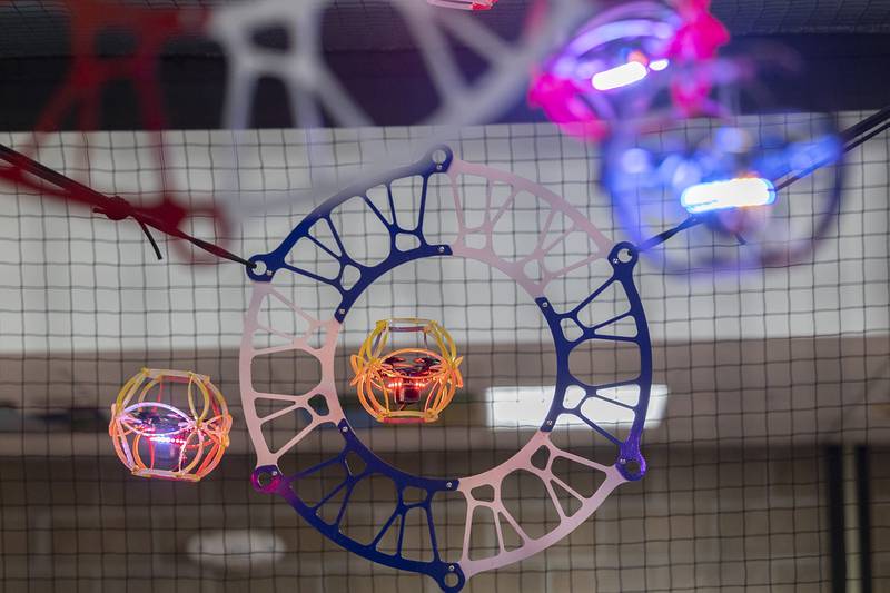 Each team has five drones in the arena at a time. The striker scores by flying through the opponents' goal. A forward, two sweepers and a goalie work to block and offer scoring support.