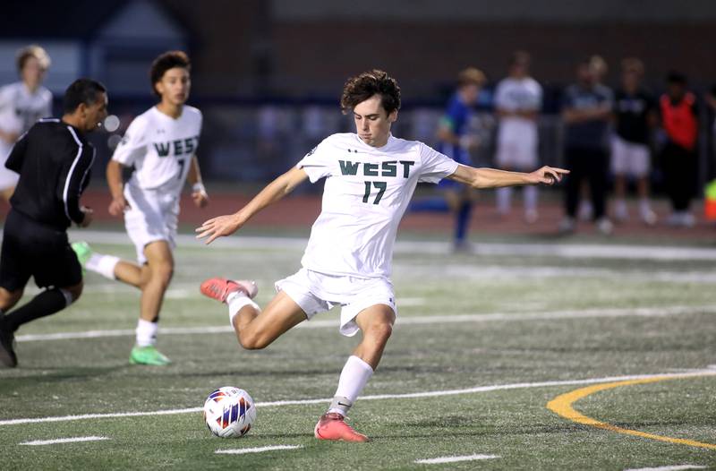 Glenbard West’s Chris Weber kicks the ball during the Class 3A St. Charles North Sectional semifinal against Geneva on Tuesday, Oct. 29, 2024 in St. Charles.