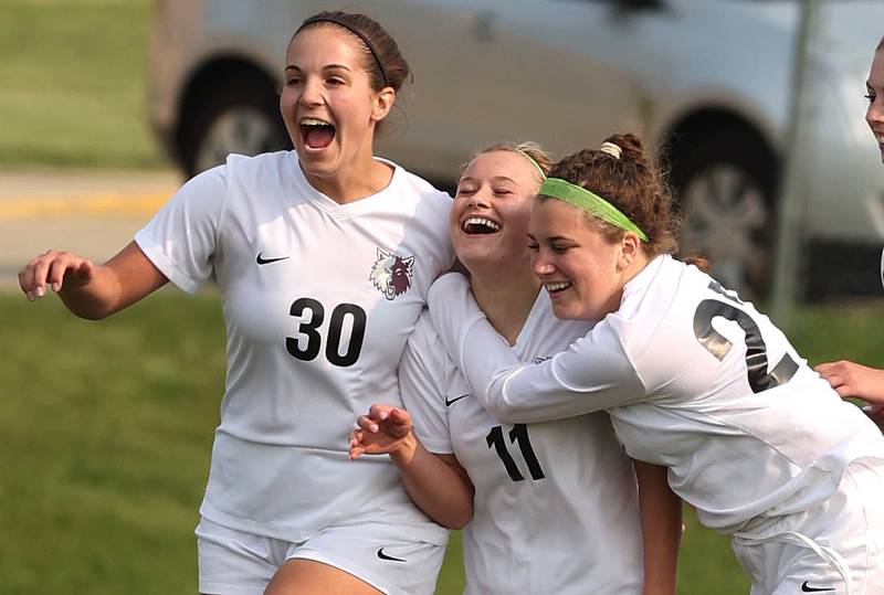 Prairie Ridge's Maria Falkowska (middle) celebrates her goal during their game against Sycamore Wednesday, May 17, 2023, at Sycamore High School.