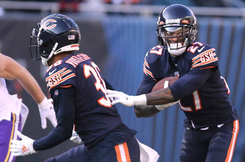 Chicago Bears cornerback Greg Stroman Jr. carries the ball after intercepting Minnesota Vikings quarterback Nick Mullens Sunday, Jan. 8, 2023, during their game at Soldier Field in Chicago.