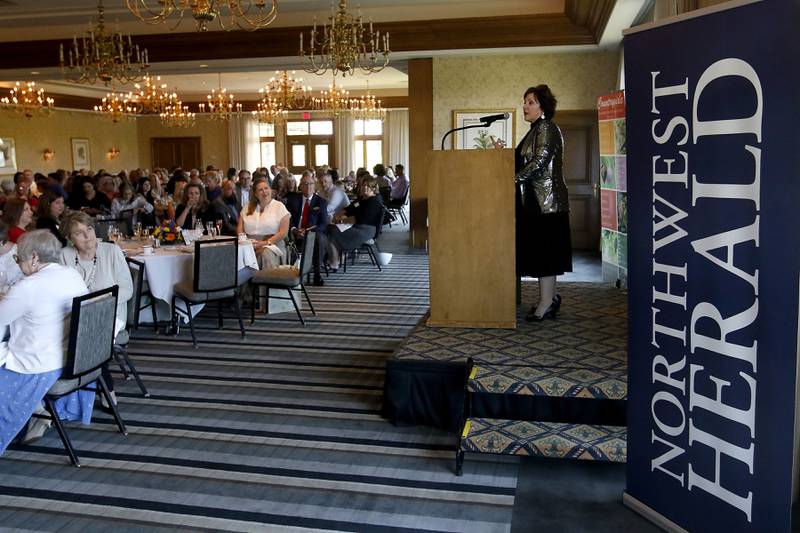 Kathleen Caldwell, of Caldwell Consulting Group, speaks during the Northwest Herald's Women of Distinction award luncheon Wednesday June 29, 2022, at Boulder Ridge Country Club, 350 Boulder Drive in Lake in the Hills. The luncheon recognized 10 women in the community as Women of Distinction plus Lisa Hoeppel as the first recipient of the Kelly Buchanan Woman of Inspiration award.
