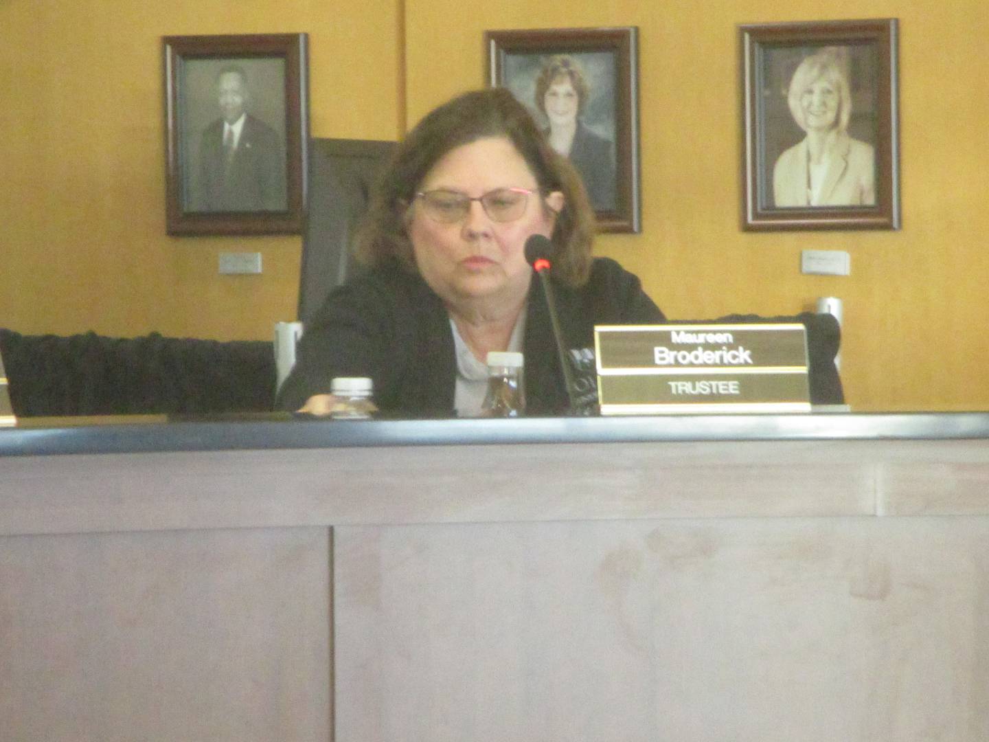 Joliet Junior College Trustee Maureen Broderick waits for the start of a board meeting on Oct. 7, 2024.