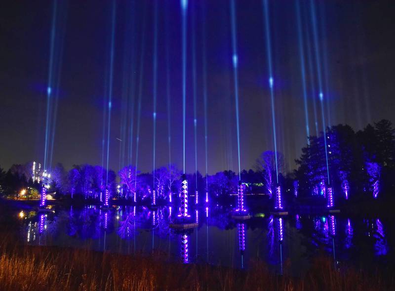 Floating, mirrored towers on Meadow Lake send beams of light into the sky for the finale of “Illumination.”
