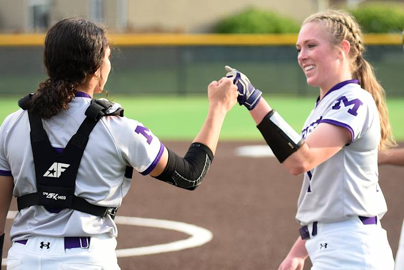 Manteno's Ava Peterson, right, celebrates with teammate Jaz Manau after the Panthers' 13-2 win at Coal City Monday, May 12, 2025.