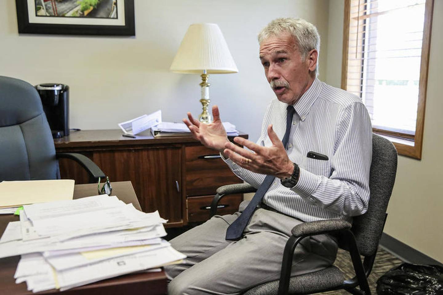 Paul Lauridsen, the executive director of Stepping Stones, speaks with the Herald-News on Tuesday, June 25, 2019, at his office in Joliet, Ill.
