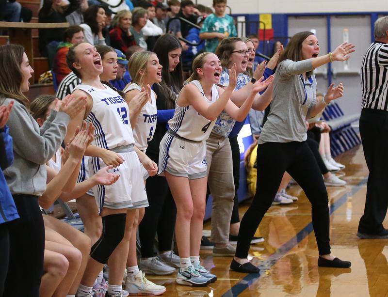 Members of the Princeton Lady Tiger basketball team react after pulling ahead of Putnam County in the third quarter during the Princeton High School Lady Tigers Holiday Tournament on Thursday, Nov. 16, 2023 at Prouty Gym.