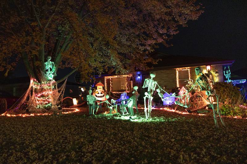 Several home along North Dement in Dixon has picture worthy Halloween scenes, including this one showing skeletons at play.