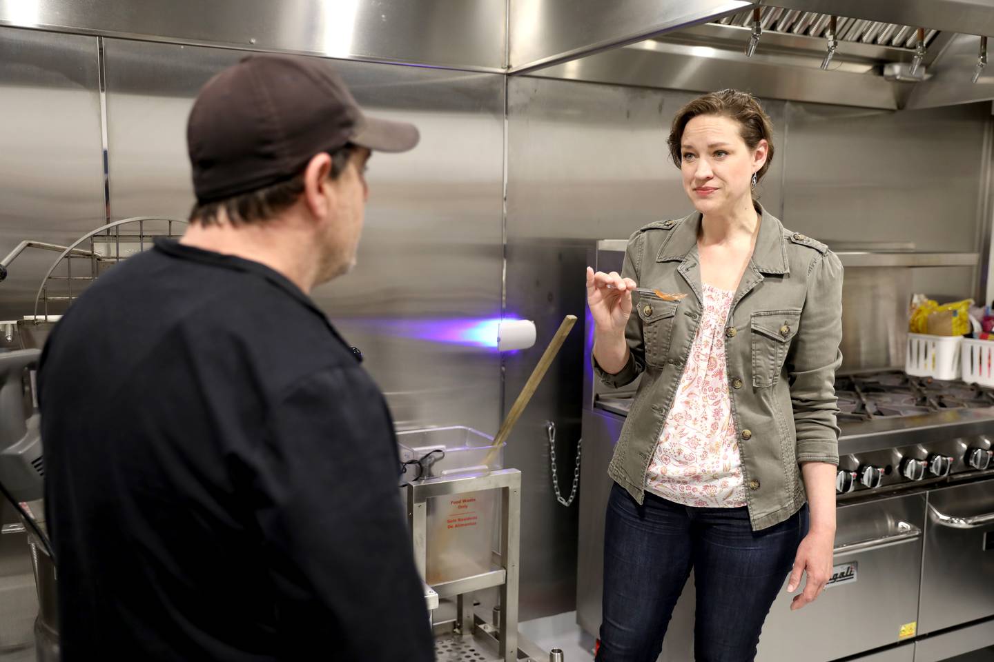 Mary Ginder tastes a new batch of sauce made by her husband, Chris Ginder at Gindo’s Spice of Life in St. Charles. Gindo’s owners Chris and Mary Ginder each won awards recently from the Small Business Association.