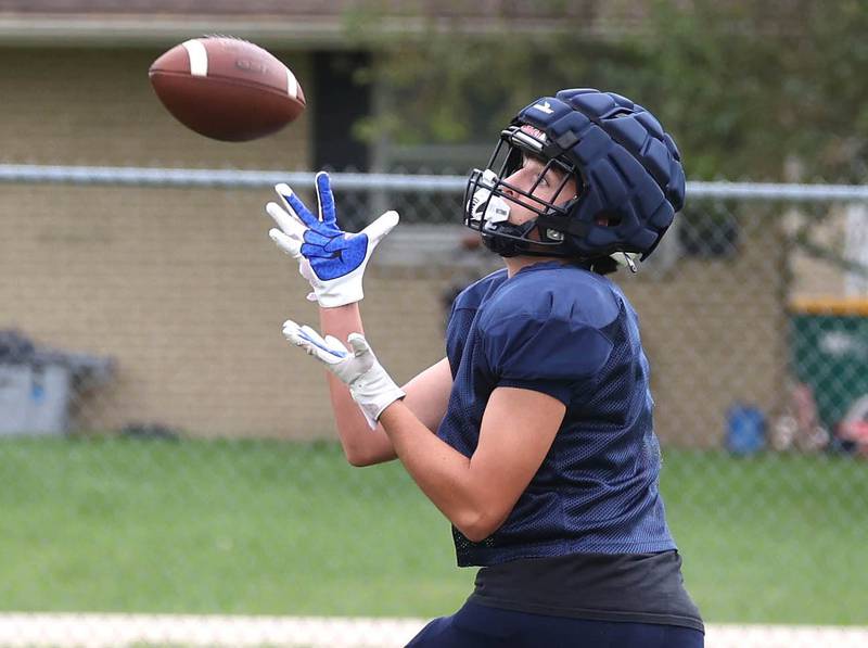 Hiawatha’s Colby Wylde catches a pass Tuesday, Aug. 19, 2025, during practice at the school in Kirkland.