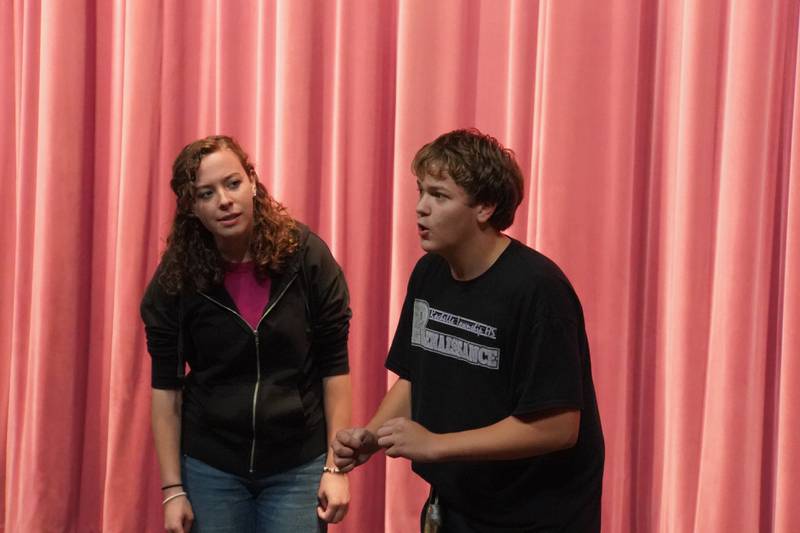 Narrator 1 and Narrator 2 played by Aletheia Venuso (left) and Derek Swartz.