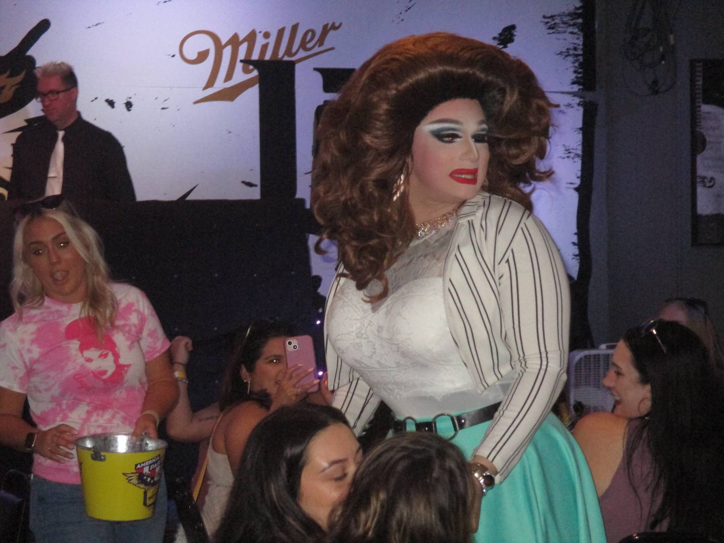 Drag queen Fox E. Kim works the crowd during the brunch show at Yorkville's Pinz Entertainment Center on Aug. 21, 2022.