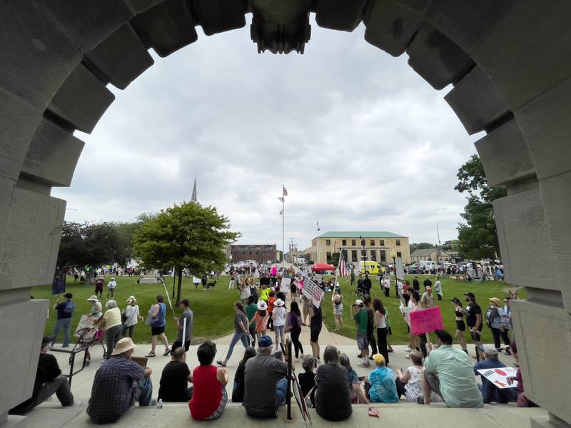 Approximately 500 protesters march the sidewalks at the Kankakee County Courthouse for a ‘No Kings’ rally in Kankakee on Saturday, June 14, 2025, to protest actions by President Donald Trump.
