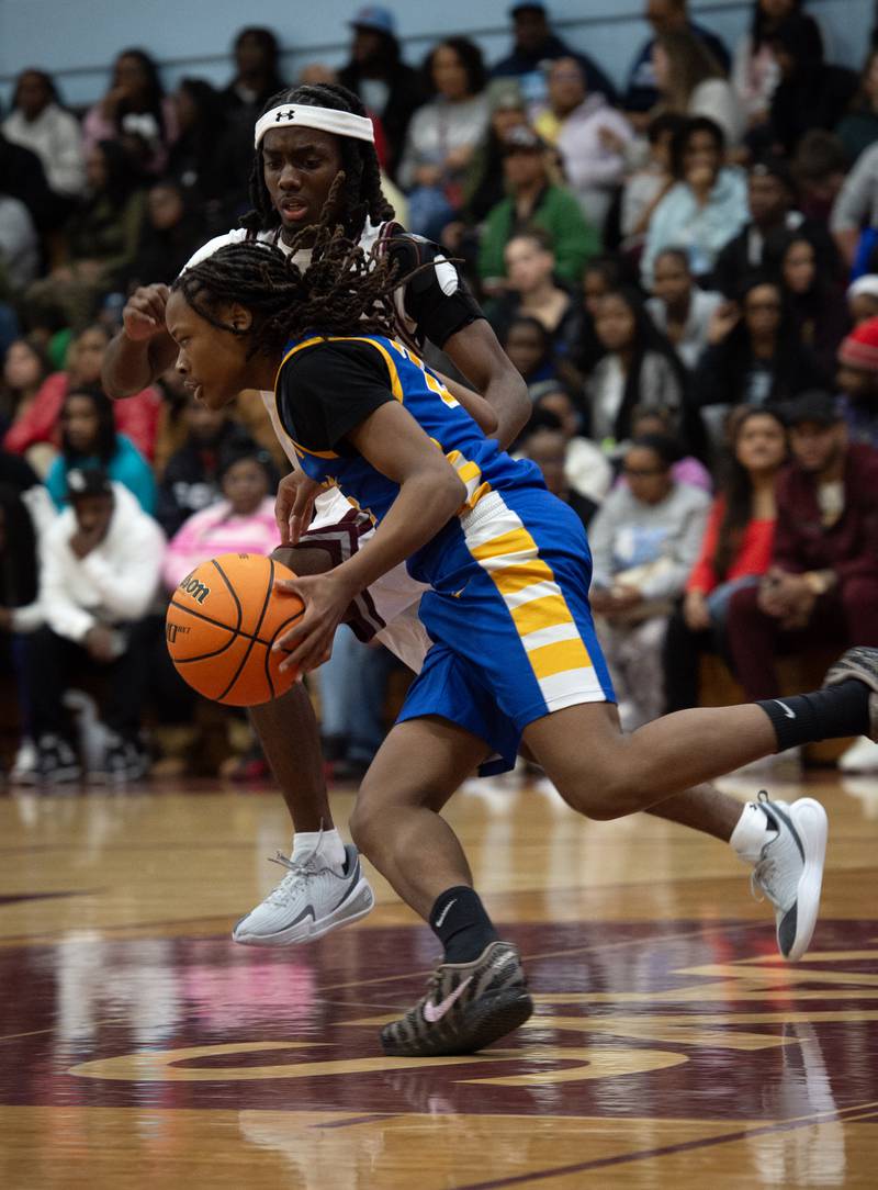 Kankakee's Cedric Terrell III guards Crete-Monee's Zhakeem Cole in a game on Friday, January 9, 2026.