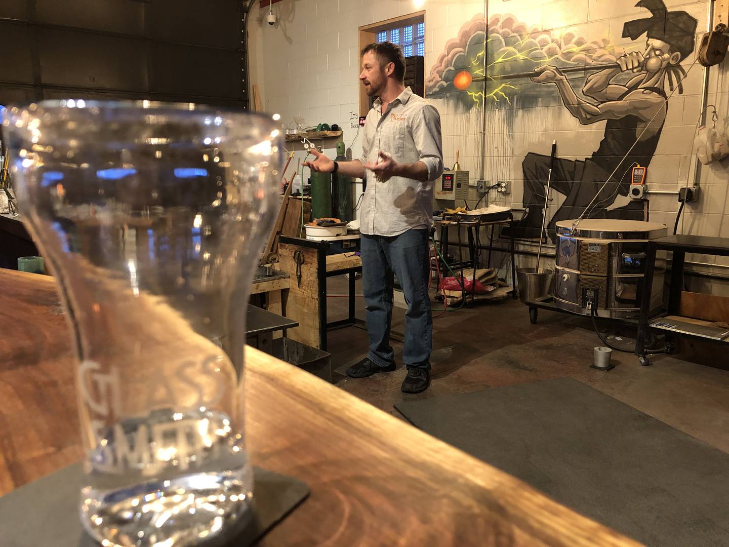 Jeff Popp, the bar smith at The Glass Smith in downtown Richmond, explains the art of glassmaking on Thursday, March 14, 2024.