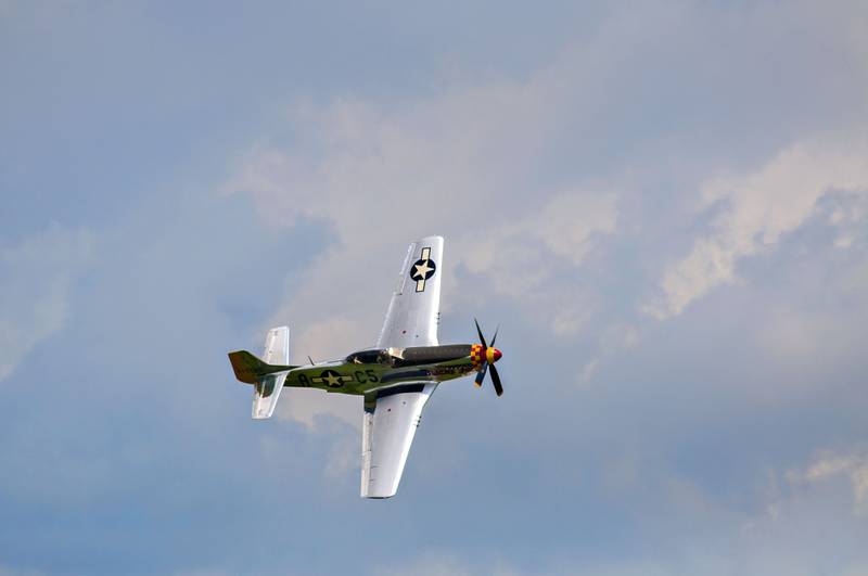 A P-51 Mustang piloted by Robert Dixon makes its rounds at the ACCA Air Show on Saturday, July 24, 2021, at Whiteside County Airport.