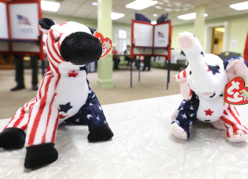 Red, White and Blue Beanie Babie's Lefty and the Patriotic Donkey greet voters at Zion United Church of Christ on Tuesday, April 4, 2023 in Peru.