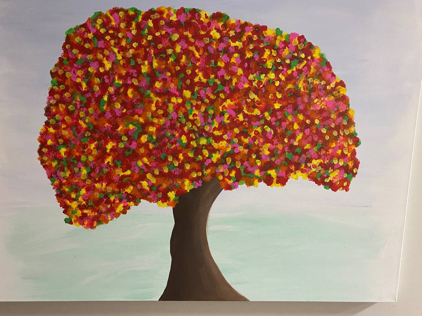 Three canvases of painted acrylic trees now hang on the hallway wall leading to the treatment room of the Radiation Therapy Center of Morris Hospital. Two paintings are “vibrant with colorful leaves,” but the last and largest tree is nearly bare. Staff call it Tree of Hope.