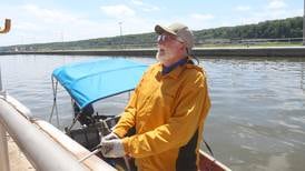 Photos: 'Ageless Wanderer' Robert Youens passes through Starved Rock on a Jon boat