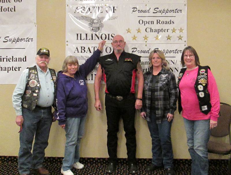 Pictured are Open Roads ABATE Chapter members with the Open Roads Banner supporting State Seminar for nine consecutive years – (from left) Cliff and Linda Oleson, Sam and Sharyl Mataya and Diana Rebechini.