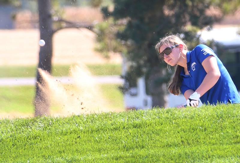 Princeton's Anika Hansen gets out of the bunker on the 9th hole during the Class 1A Regionals on Tuesday, Sept. 30, 2025 at Spring Creek Golf Course in Spring Valley.