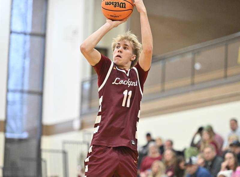 Lockport's Nedas Venckus shoots a jump shot during the WJOL tournament championship game against Lemont on Saturday, NOV. 29, 2025, at Joliet.