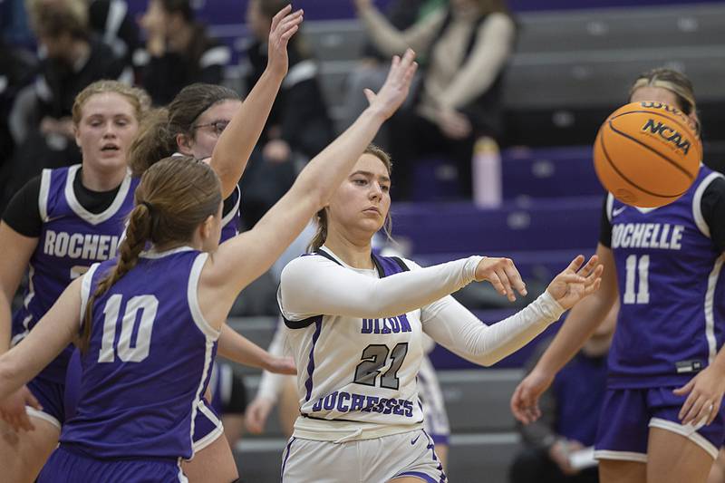 Dixon's Reese Dambman makes a pass against Rochelle Thursday, Dec. 26, 2024, during the Dixon Girl’s KSB Holiday Basketball Tournament.