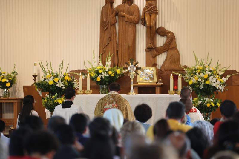 The Eucharist, or the Blessed Sacrament, is displayed in St. John Paul II Catholic Church as parishioners join in prayer during a service as part of the National Eucharistic Pilgrimage on Sunday, May 18, 2025.