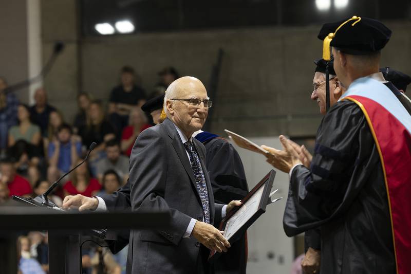 John Berge receives an honorary degree Friday, May 9, 2025, during Sauk Valley Community College’s commencement ceremony. Berge founded McFalls, Berge and Associates PLLC.