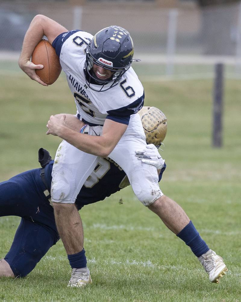 Hiawatha’s Aidan Cooper fights for yards against Polo Saturday, Nov. 1, 2025, in the 8-man football playoff quarterfinals.