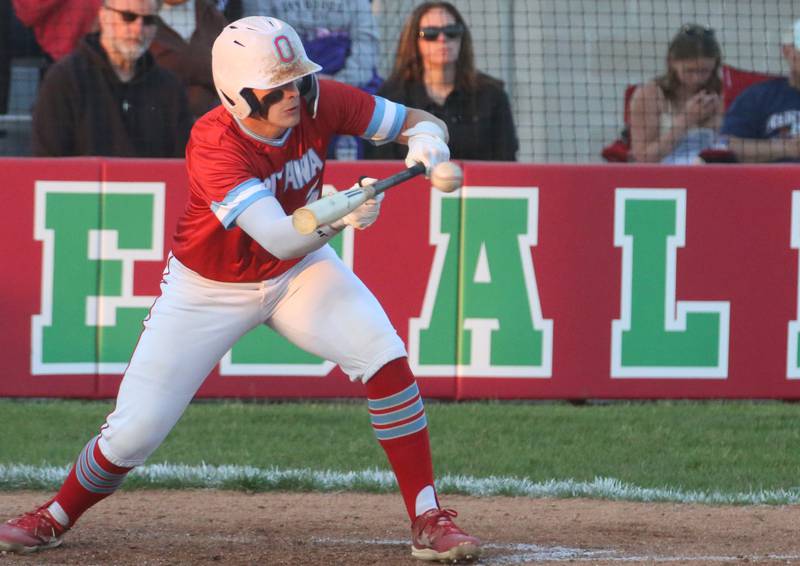 Ottawa's Packston Miller lays down a bunt against Plano during the Class 3A Regional semifinal game on Wednesday, May 22, 2024 at Huby Sarver Field in La Salle.