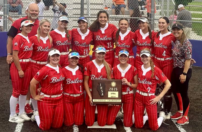 Members of the Bradley-Bourbonnais softball team pose with the Class 4A Supersectional plaque after defeating Edwardsville on Friday, June 6, 2025 at Monticello High School.